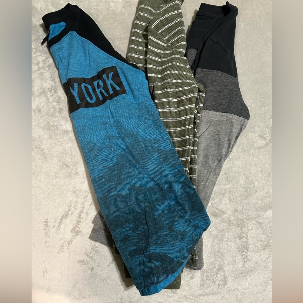 3 long sleeve t-shirts.